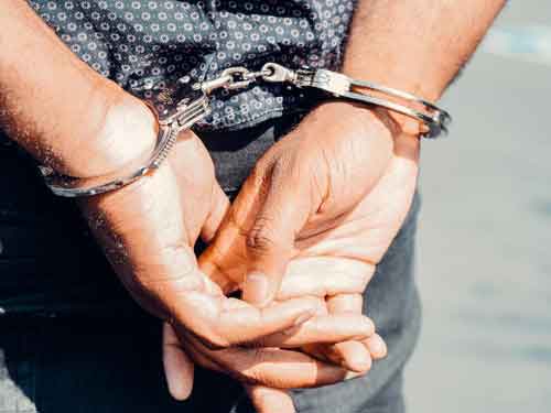 Two arrested with arms & ammunition in Srinagar