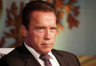 Schwarzenegger caught kissing mystery woman amid Heather Milligan romance