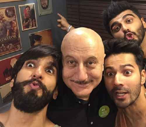 Anupam is reminded of ‘Padosan’ as he poses with Varun, Ranveer, Arjun