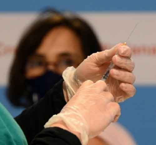 WHO warns of persistent threats from Covid