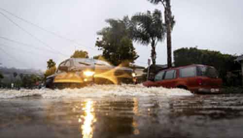Heavy downpour, floods batter California