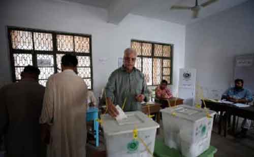 Pakistan polls: Voting underway, security officer killed