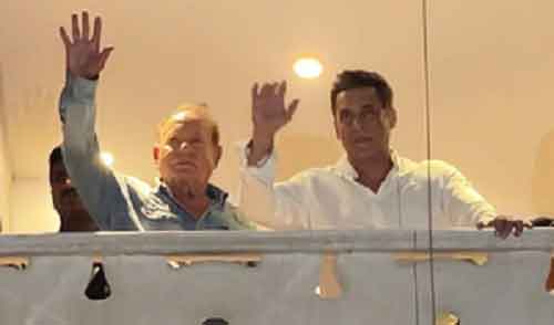 Salman, joined by father Salim Khan, greets cheering crowds outside Galaxy Apts