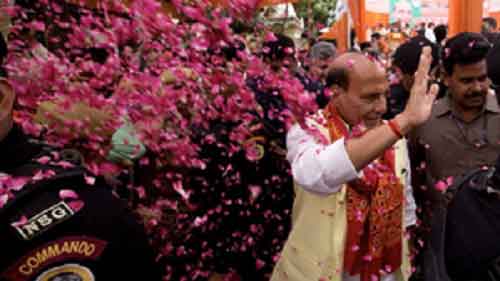 Union Minister Rajnath Singh files nomination from Lucknow, CMs Yogi, Dhami join roadshow