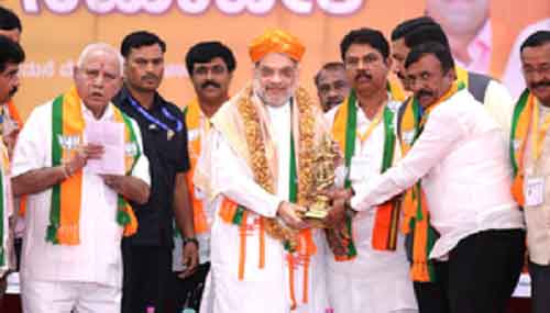 K’taka CM saving his chair which Dy CM is trying to snatch: Amit Shah