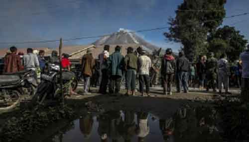 Thousands evacuated as volcanic eruptions wreak havoc in Indonesia