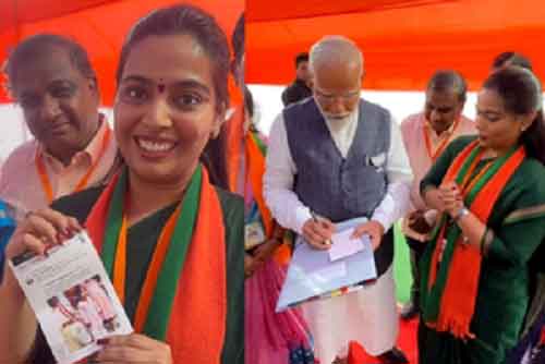 In Telangana, PM Modi gives autograph on photo of girl who sang a song on him