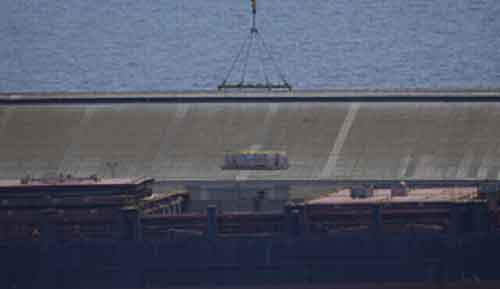 Cyprus says aid to Gaza to be temporarily held in floating storage