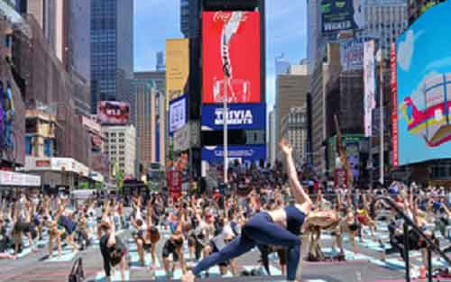 Yogis create island of stillness at New York’s frenetic Times Square