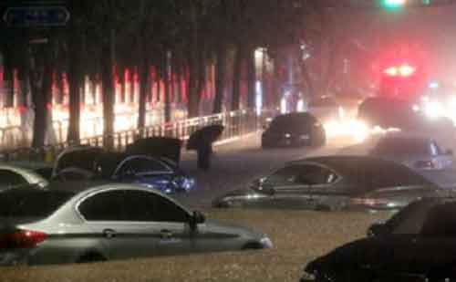 Landslides, power outages reported as heavy rain soaks South Korea