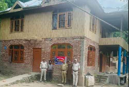 J&K Police attaches property of drug peddler in Baramulla