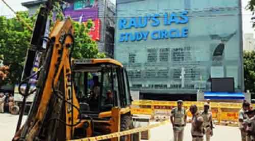 Bulldozer action in Old Rajinder Nagar after 3 drown in flooded basement; JE, AE sacked