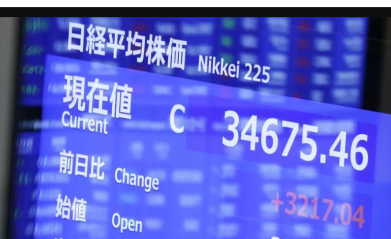 Tokyo Stocks Rise on Weaker Yen and US Gains