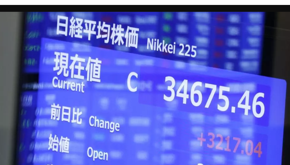 Tokyo Stocks Rise on Weaker Yen and US Gains