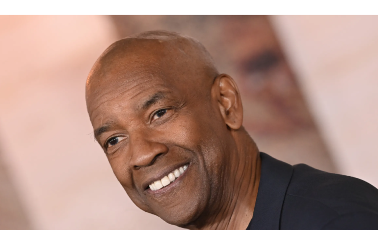 Denzel Washington gets baptized and receives a minister’s license