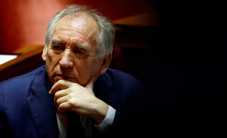 French PM unveils new cabinet, including two former prime ministers