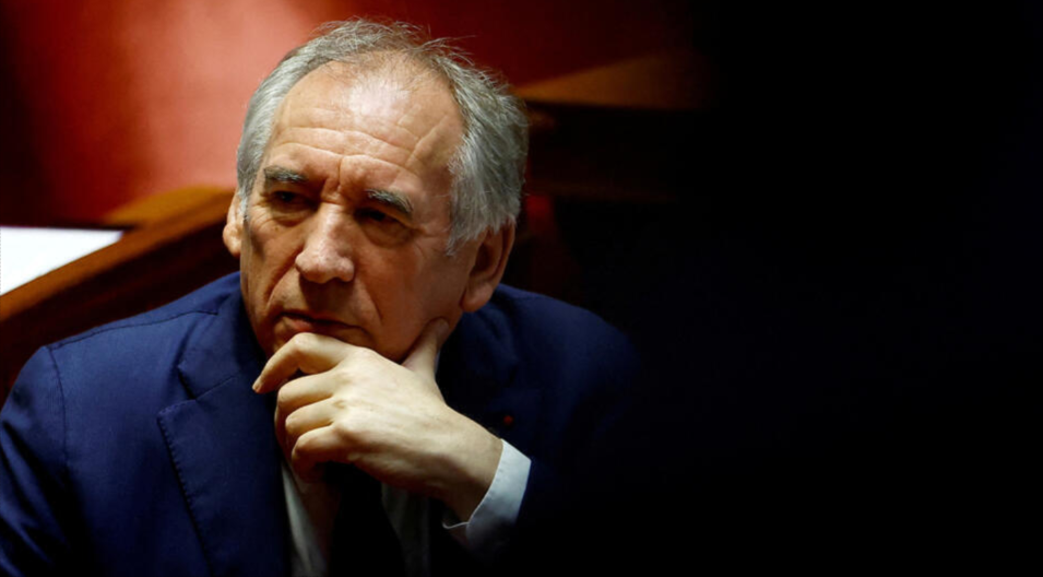 French PM unveils new cabinet, including two former prime ministers