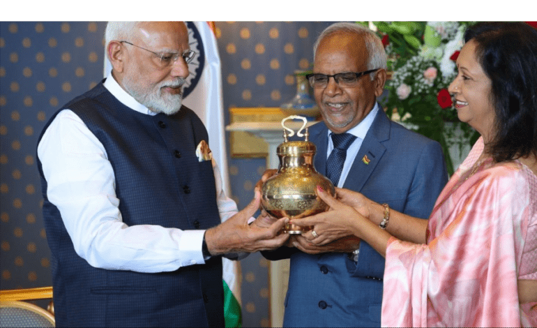 PM Modi hands over OCI cards to Mauritius President