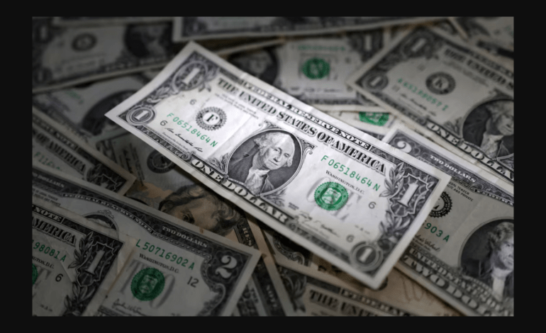 US markets and dollar fall after Trump’s new tariffs