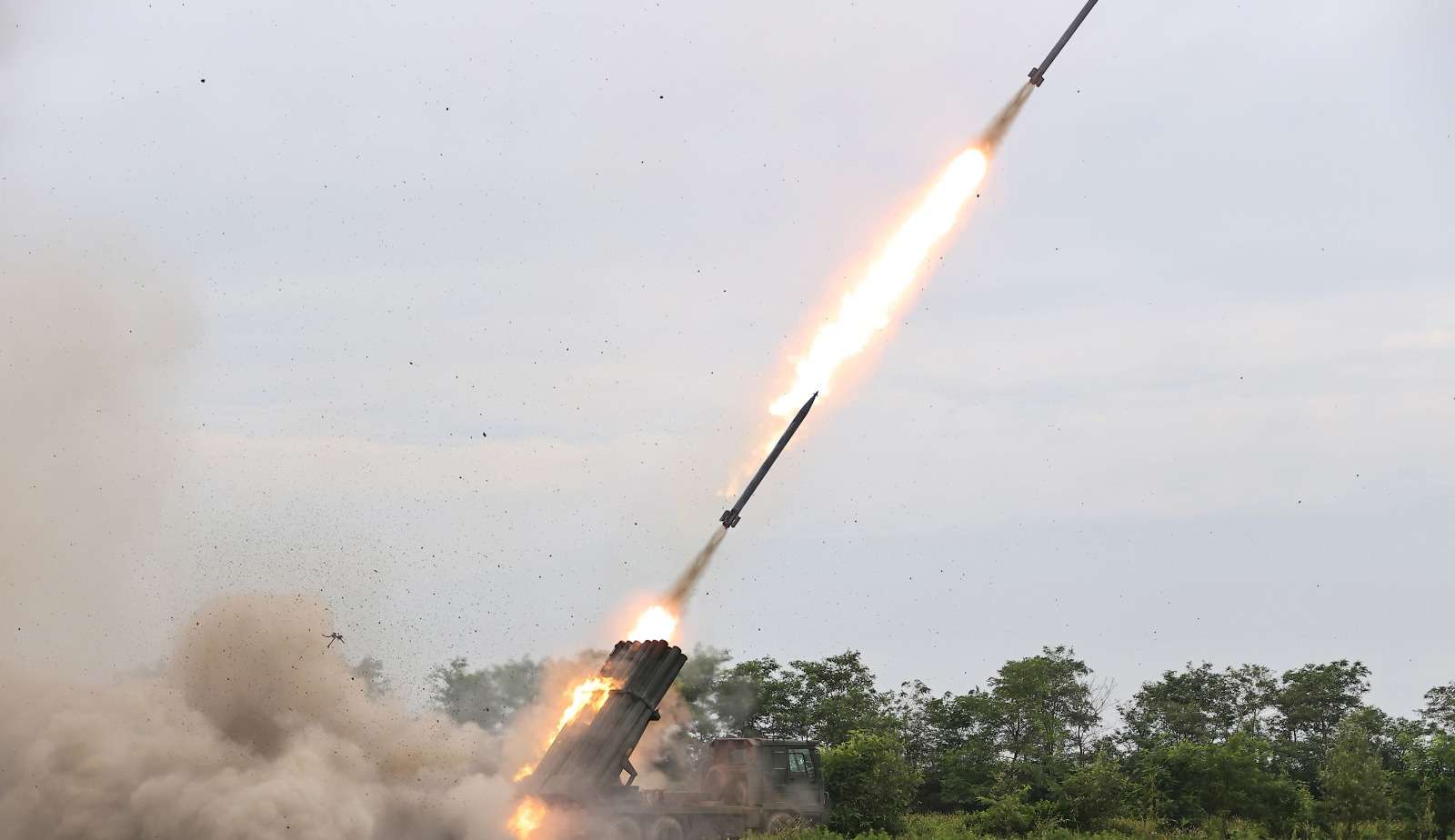 North Korea fires rocket launcher shells after trilateral air drills