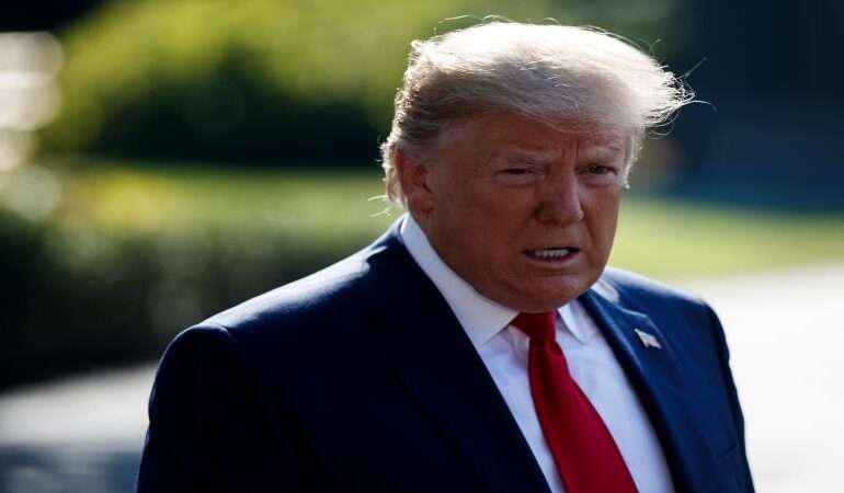 Trump hints at major trade deals, promotes new stablecoin law