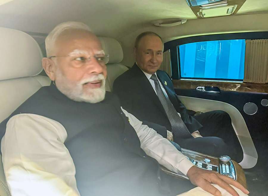 Bonhomie on display as PM Modi, Putin ride together at SCO Summit