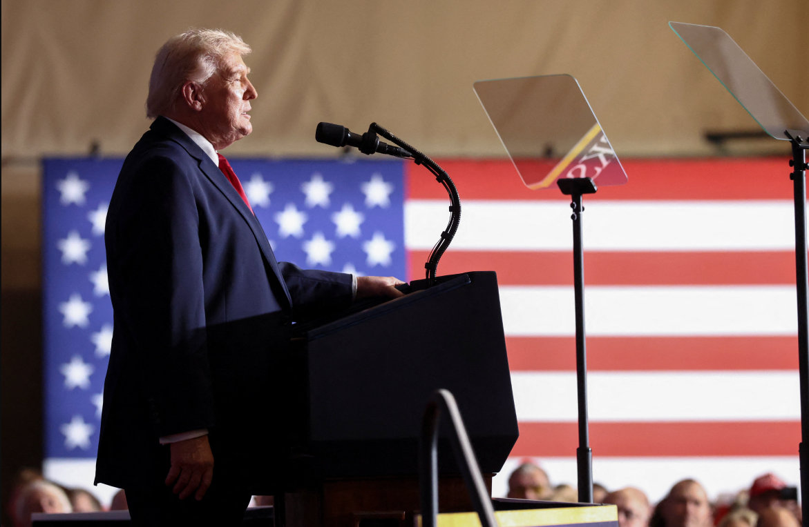 Trump warns Iran amid talks, says US will not back down