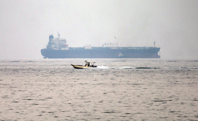Iran says container ship carrying more than 2,500 containers sank after mine strike near Strait of Hormuz