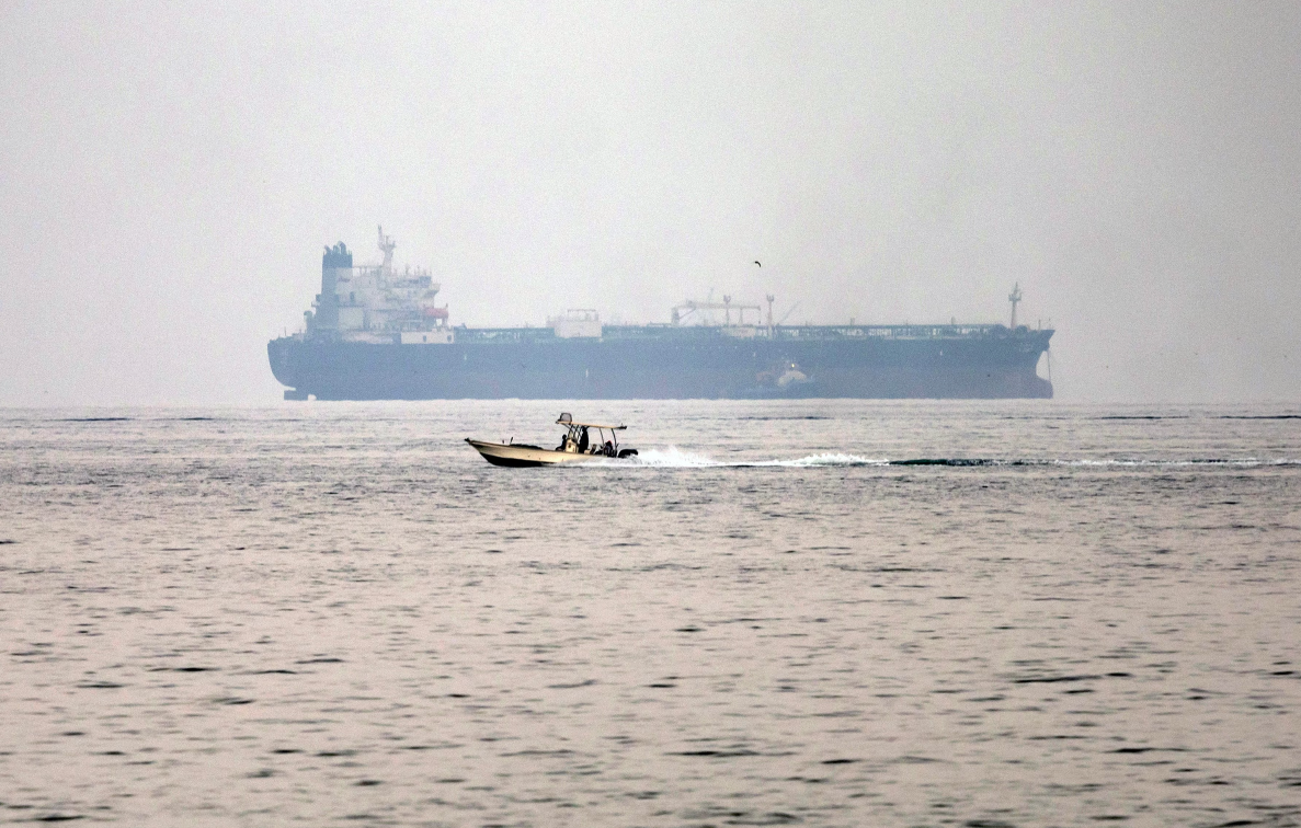 Iran says container ship carrying more than 2,500 containers sank after mine strike near Strait of Hormuz